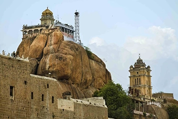 Visit Rockfort Temple with stunning views and book taxi services for a smooth trip today.