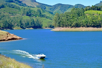 Explore Mattupetty Dam Munnar with a taxi ride and enjoy scenic views, boating, and nature.