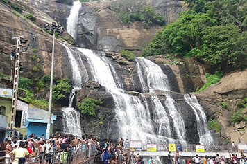 Explore Courtrallam Falls with Local Cab Booking Services Visit Courtrallam Falls with convenient local cab services for a memorable travel experience.
