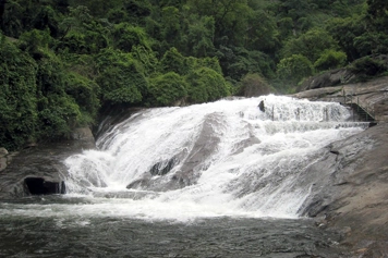 Explore Siruvani Waterfalls with Van Booking For Group Tours Enjoy a scenic drive to Siruvani Waterfalls near Coimbatore with a van booking for group tours.