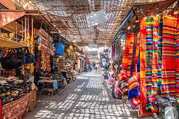 Reach Local Market in Kanyakumari By Taxi Booking Online Visitors enjoy a hassle-free trip to Kanyakumari's local market by booking taxi online
