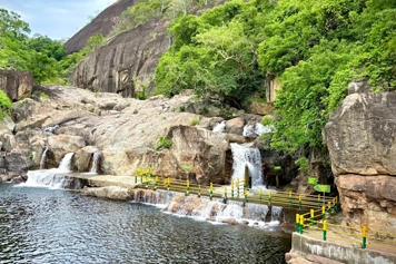 Plan Trip To Manimuthar Falls by Booking a Custom Cabs Passenger uses local cab booking to explore Manimuthar Falls with a secure and scenic journey